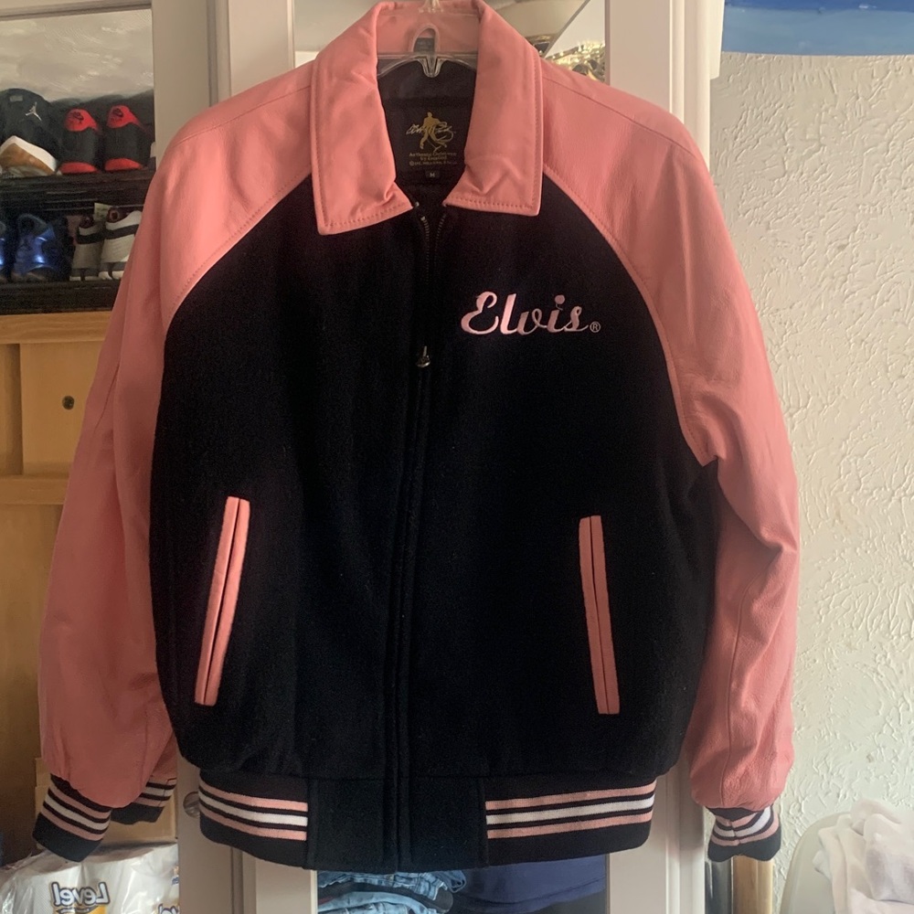 Ladies Elvis authentic black with Pink leather sleeves jacket.